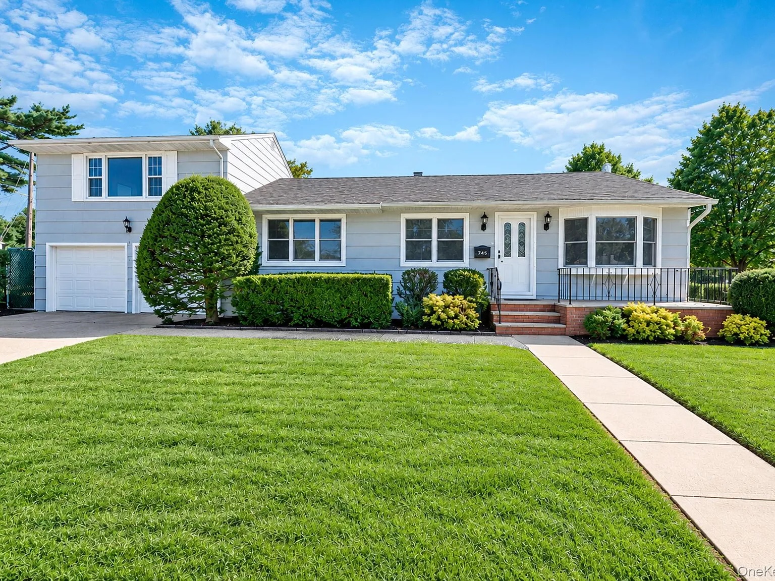 745 Anderson Avenue, Franklin Square — renovated 4-bedroom split-level on a corner lot